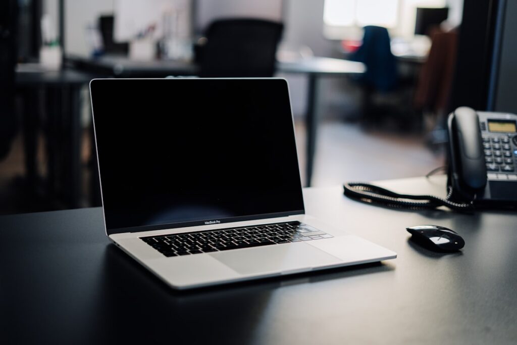 Laptop in a dim room