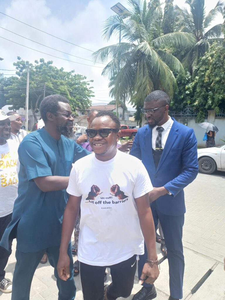 Segun Olawoye leaving the Police Special Fraud Unit accompanied by supporters and counsel