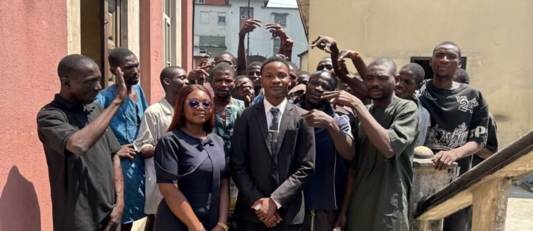 The released men with members of FDJ’s legal team outside court in Lagos